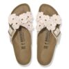Ornement floral Siena en cuir naturel Ornement floral Siena en cuir naturel