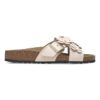 Ornement floral Siena en cuir naturel Ornement floral Siena en cuir naturel