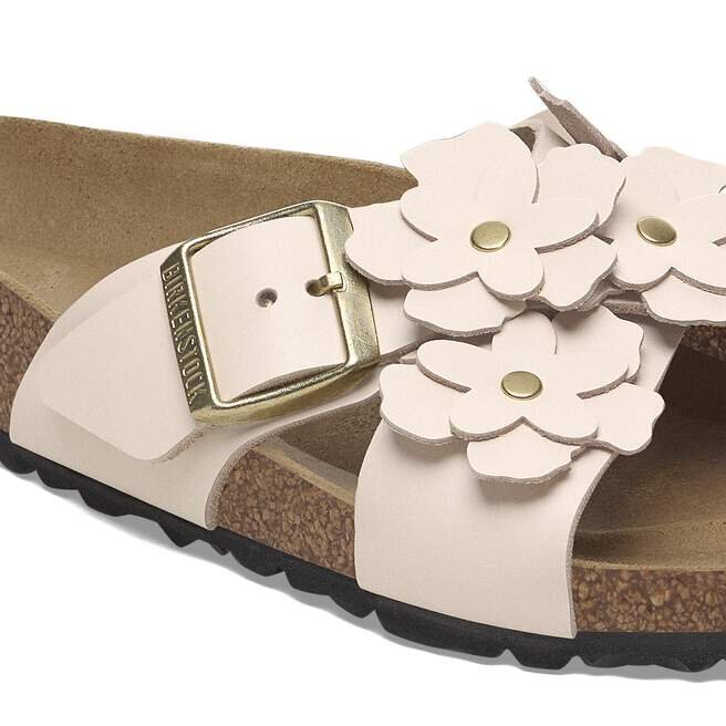 Ornement floral Siena en cuir naturel Ornement floral Siena en cuir naturel